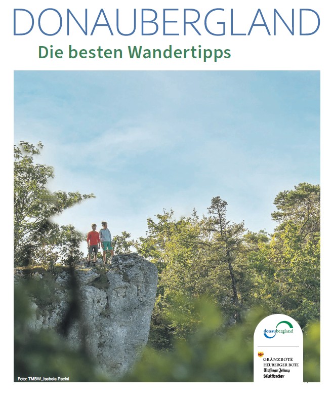 Titelbild mit zwei Wandernden auf Felskpf im Donautal